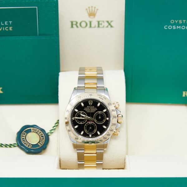 Rolex Pre-Owned Daytona Steel + Yellow Gold Black Dial on Oyster Bracelet [WITH BOX] MINT 40mm