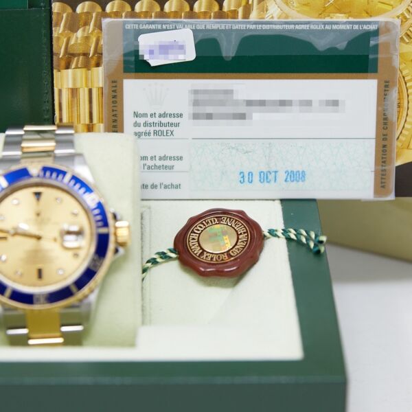 Rolex Pre-Owned Submariner Date Steel and Yellow Gold Champagne Serti Dial [COMPLETE SET] 40mm