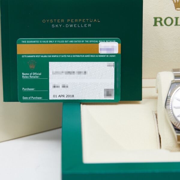 Rolex Pre-Owned Sky-Dweller Stainless Steel + White Gold White Dial on Oyster Bracelet [COMPLETE SET] 42mm