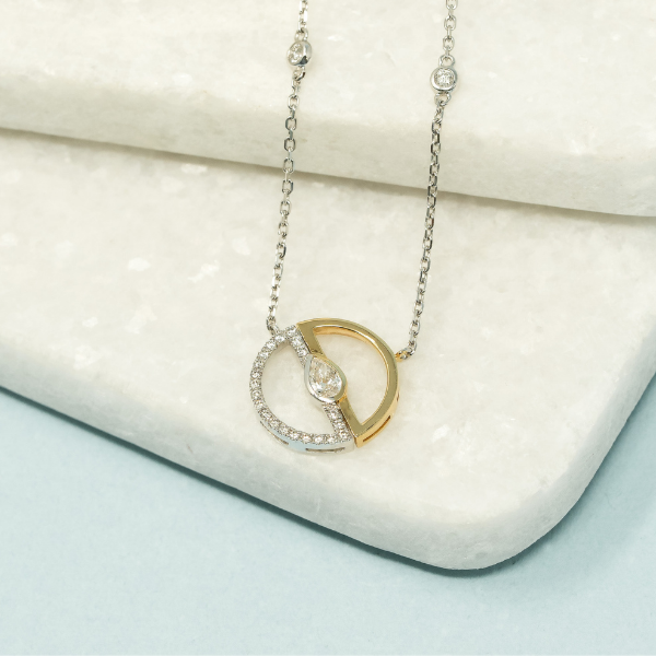 Circle Shaped Pendant with Center Pear Diamond in 18k Gold